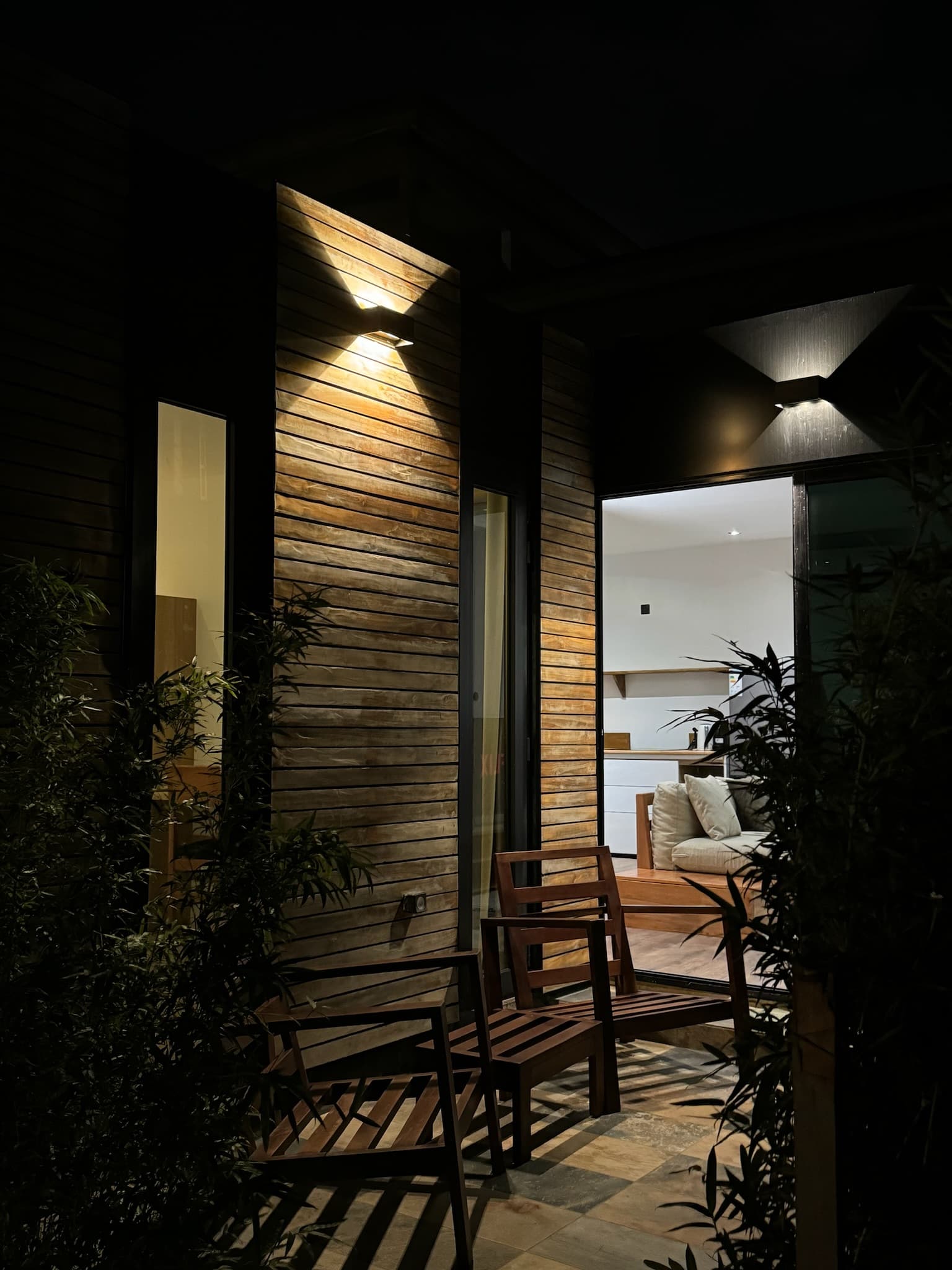 Modern wooden house at night